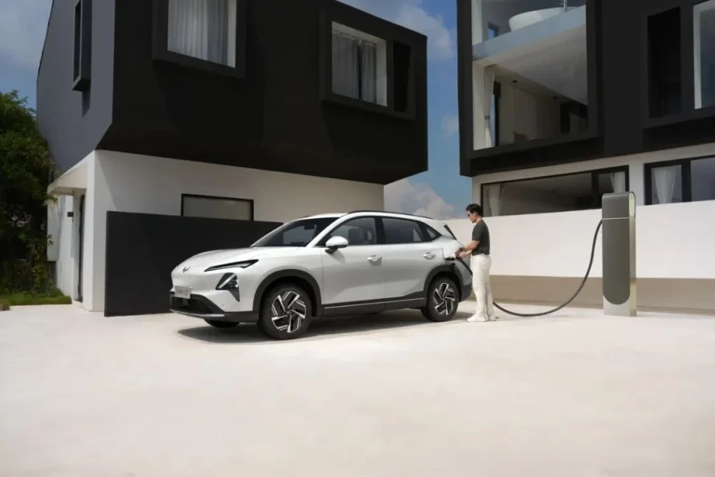 White 2025 Wuling Starlight S electric SUV at a charging point, front three-quarter view
