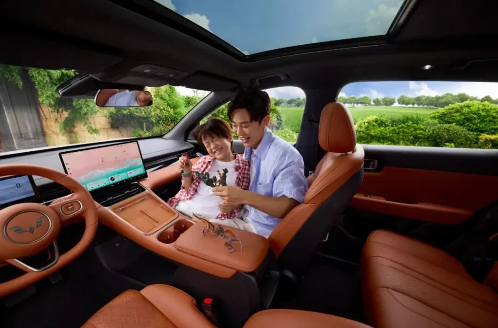 2025 Wuling Starlight S orange cockpit with central screen and panoramic roof